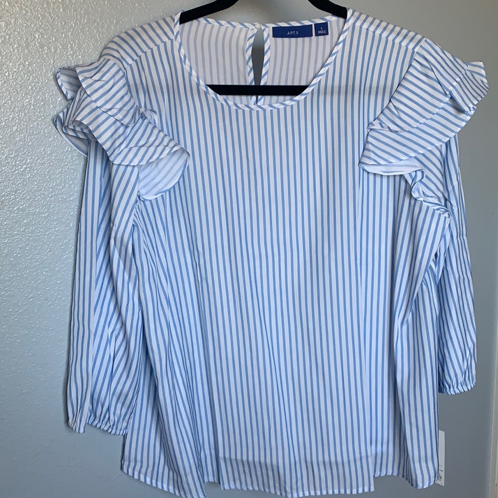 Springtime blouse brand new with tag..